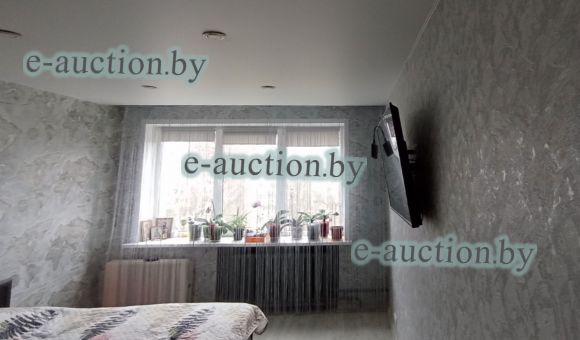 1/2 доля в праве собственности на двухкомнатную квартиру в г. Минске, площадью  48.9 м²