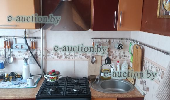 Кухонный гарнитур в виде шкафов и тумб