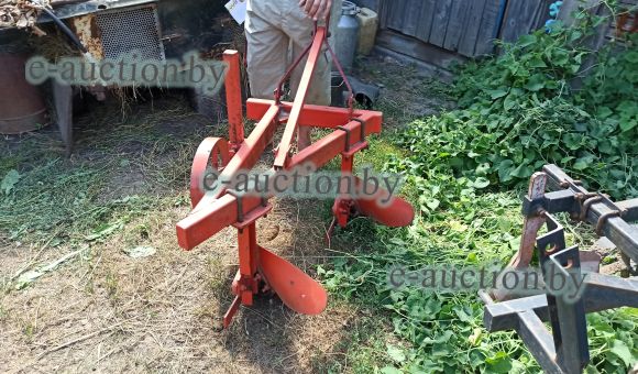 Плуг двухкорпусный