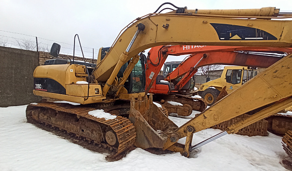 Экскаватор Caterpillar Cat 318 CL, год выпуска не определён Экскаватор Caterpillar Cat 318 CL, год выпуска не определён